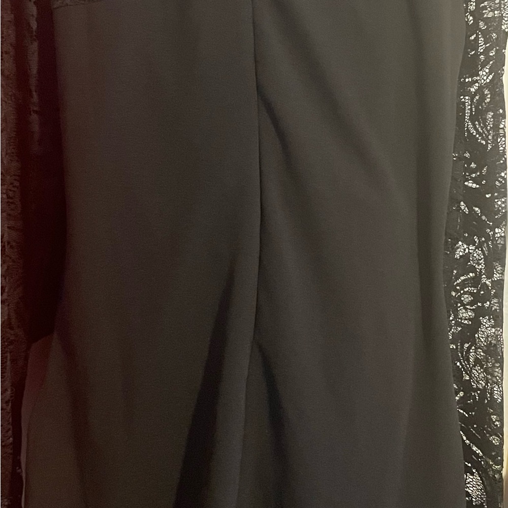 A Large, black beautiful and classy evening dress.